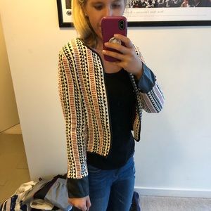 Patterned jacket, leather cuffs